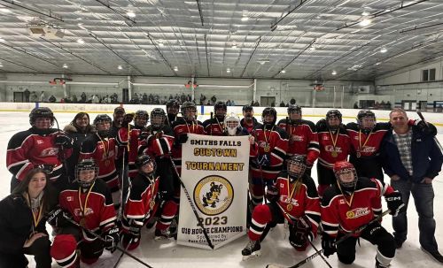 U18 Frontenac Fury team members hoisting the banner after winning the Cubtown tournament in Smiths Falls on Sunday, November 5.